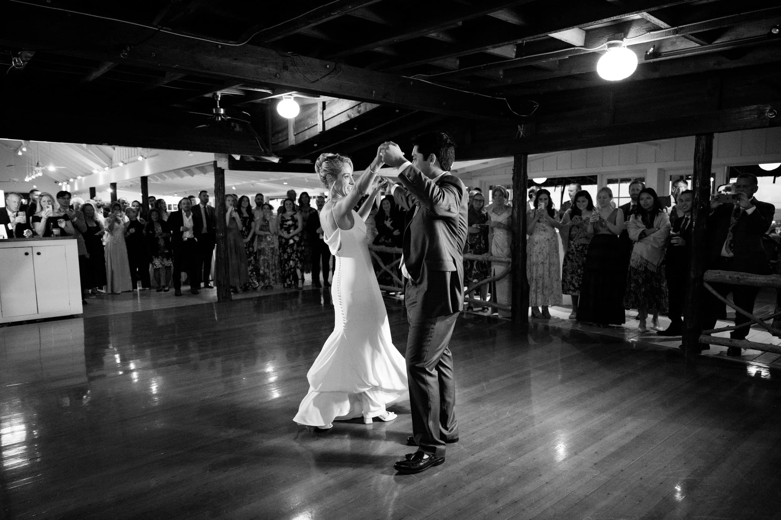 A couple sharing their first dance as the band plays